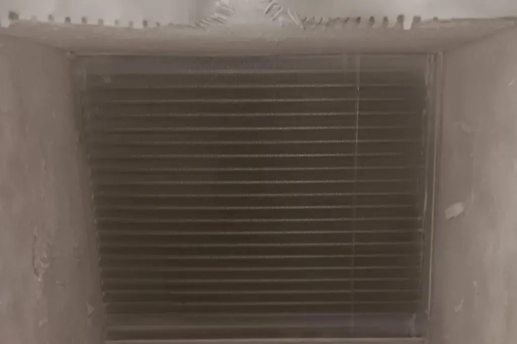 the best air duct cleaners in san antonio are cleaning this air duct